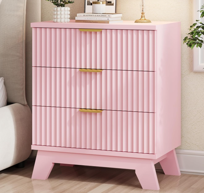 Built in bedside table with three drawers and shelving